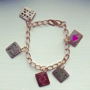 Brassy gold playing cards charm bracelet